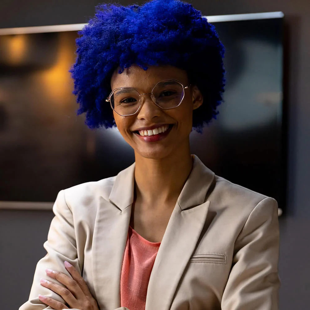 portrait-of-happy-biracial-casual-businesswoman-wi-2023-11-27-05-03-18-utc-1.webp